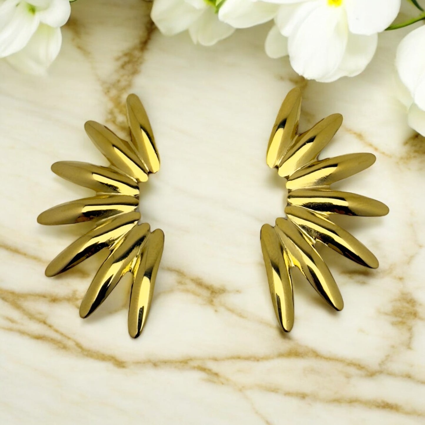 Boucles d’oreilles Aspen en acier inoxydable doré.