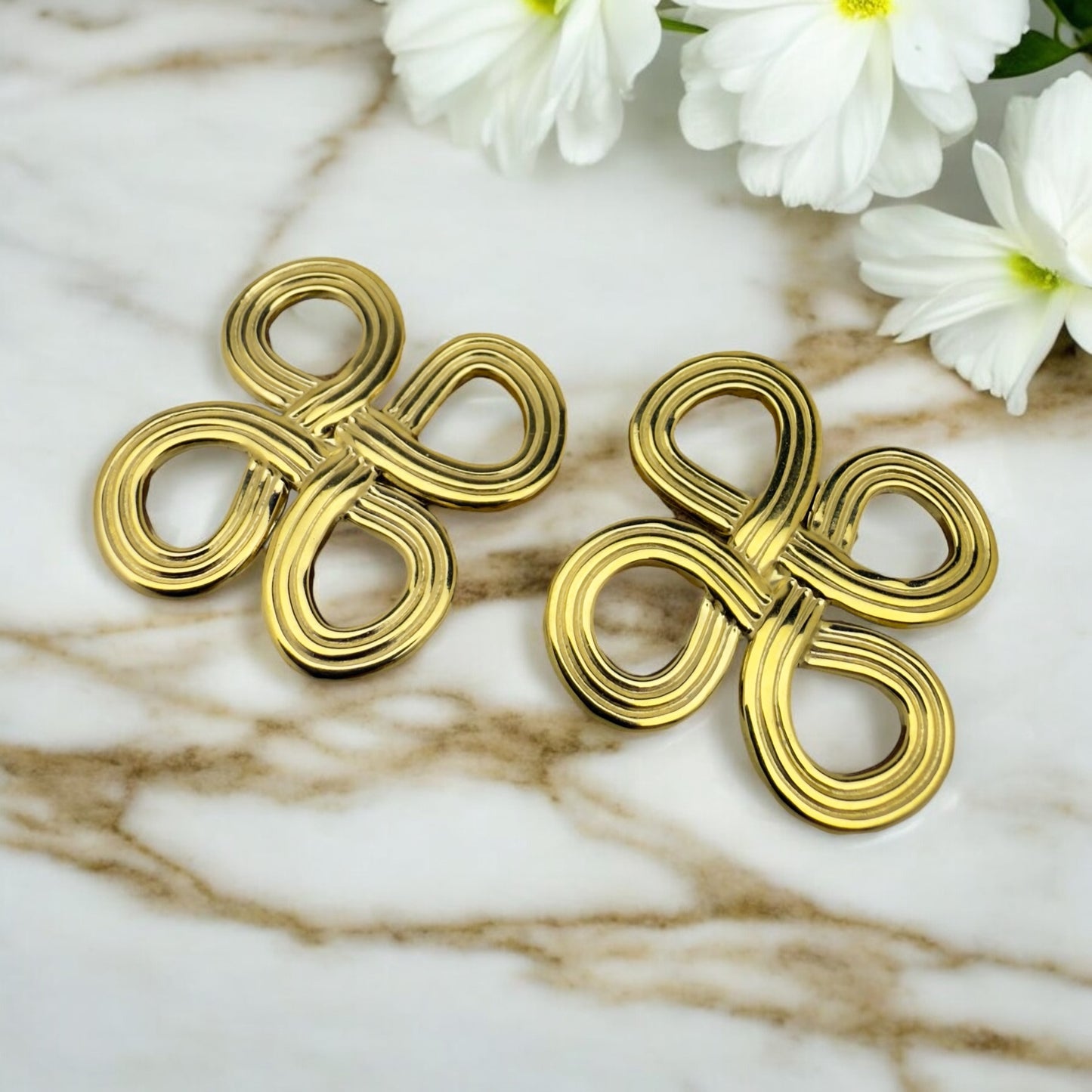 Boucles d’oreilles Berlin en acier inoxydable doré.