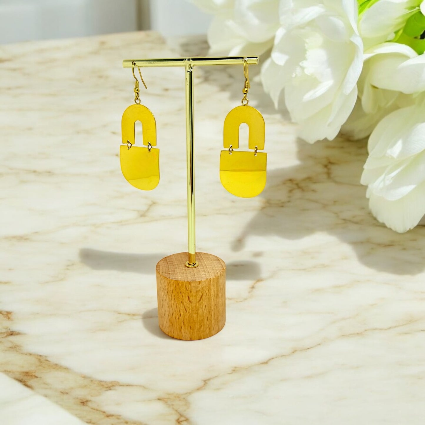 Boucles d’oreilles Newcastle en acier inoxydable doré.