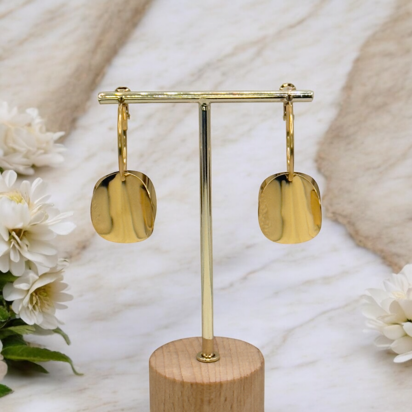 Boucles d’oreilles Saint Barth en acier inoxydable doré.