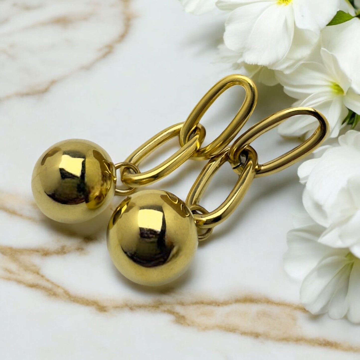 Boucles d’oreilles Soho en acier inoxydable doré.