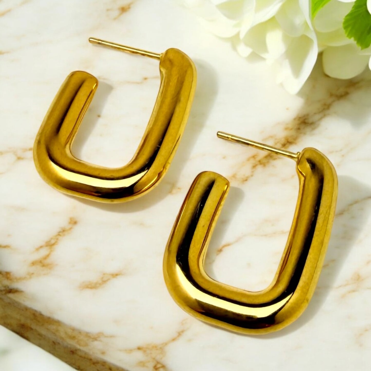 Boucles d’oreilles Stockholm en acier inoxydable doré.