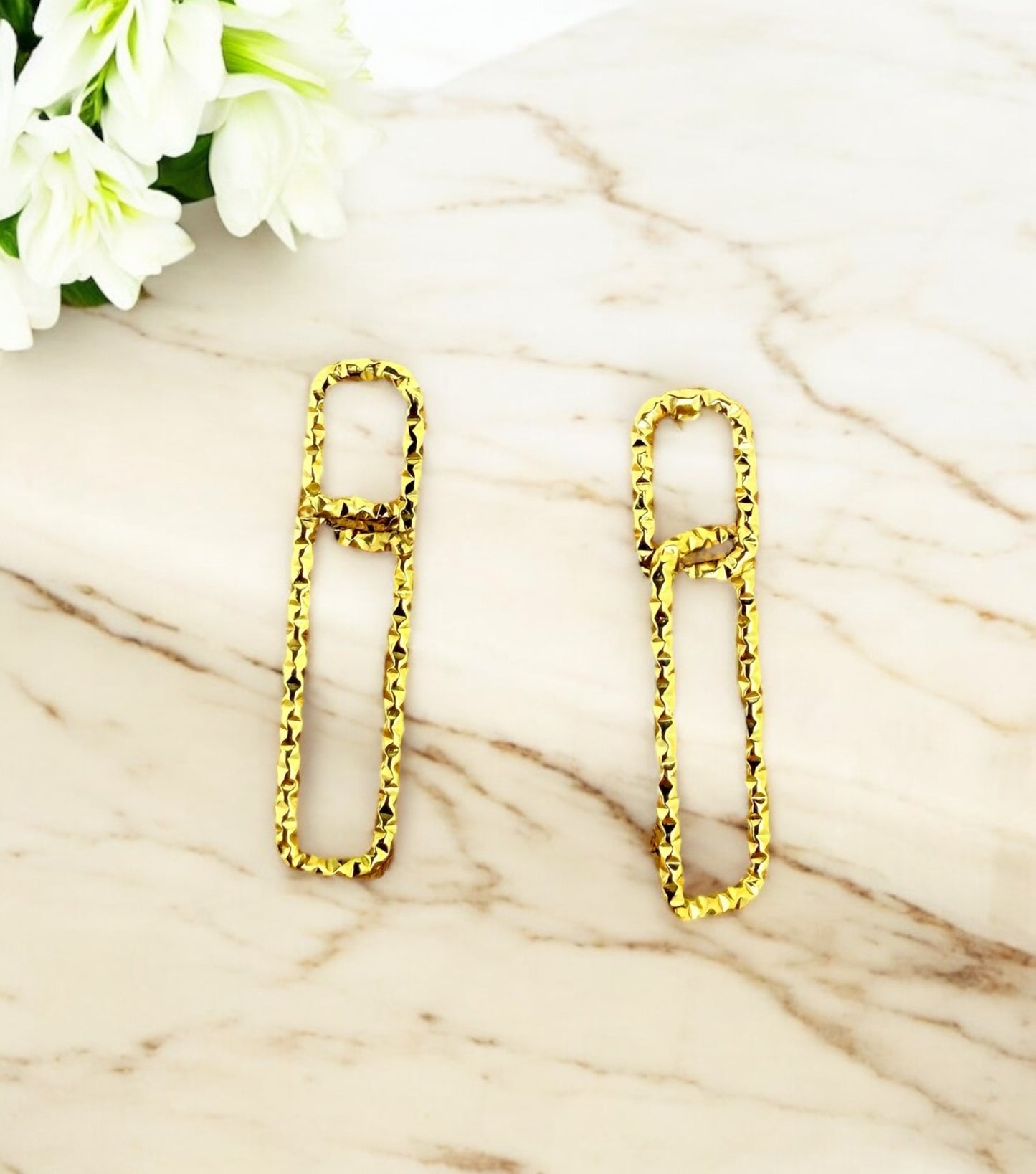 Boucles d’oreilles Capri en acier inoxydable doré.