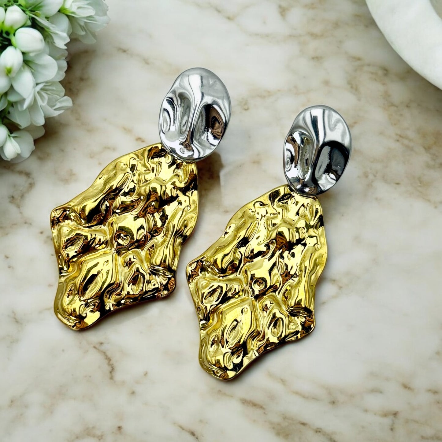 Boucles d’oreilles Anvers en acier inoxydable doré.