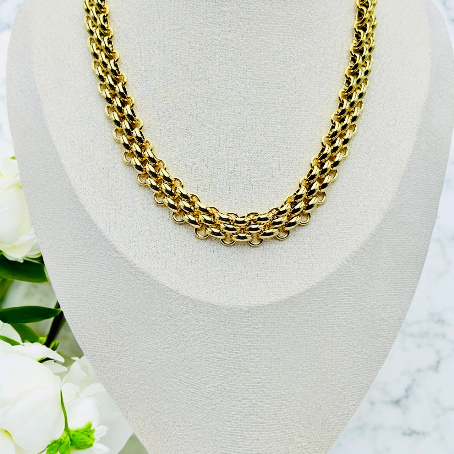 Collier Rio de Janeiro ajustable en acier inoxydable doré.