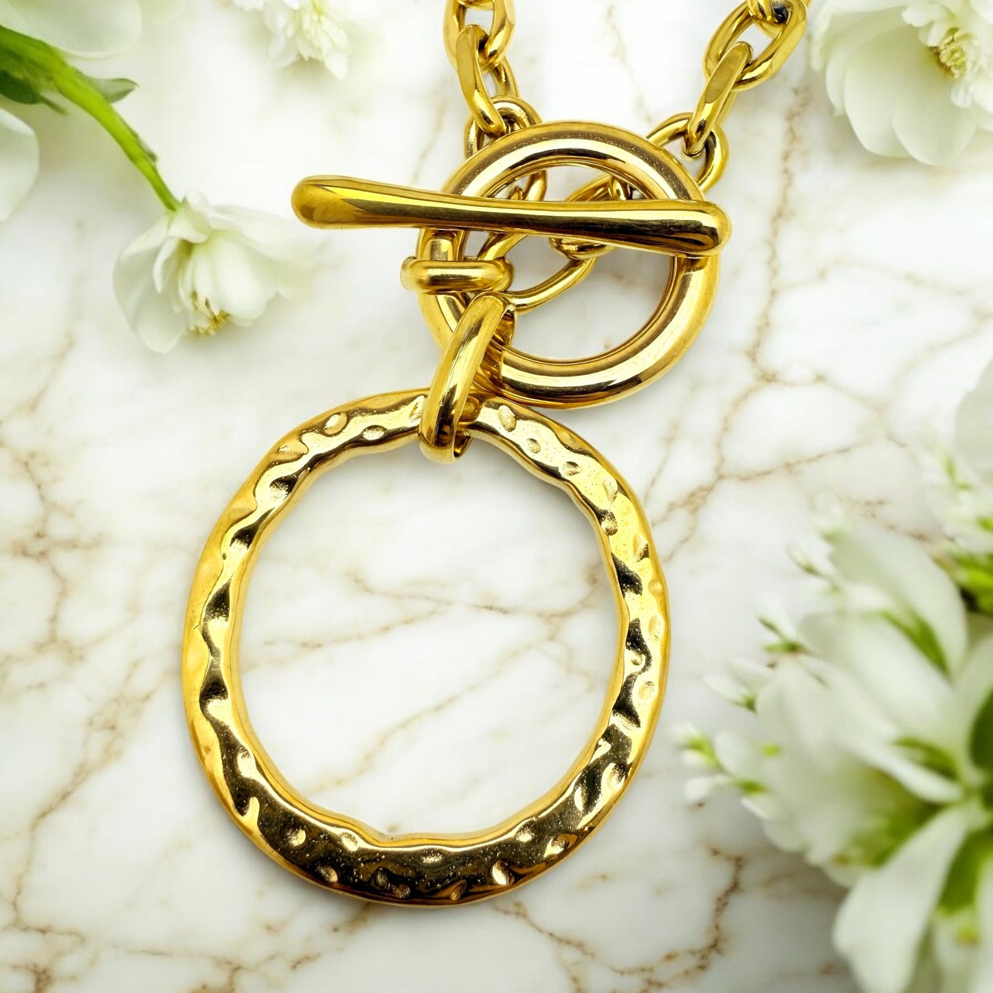 Collier Braga en acier inoxydable doré.