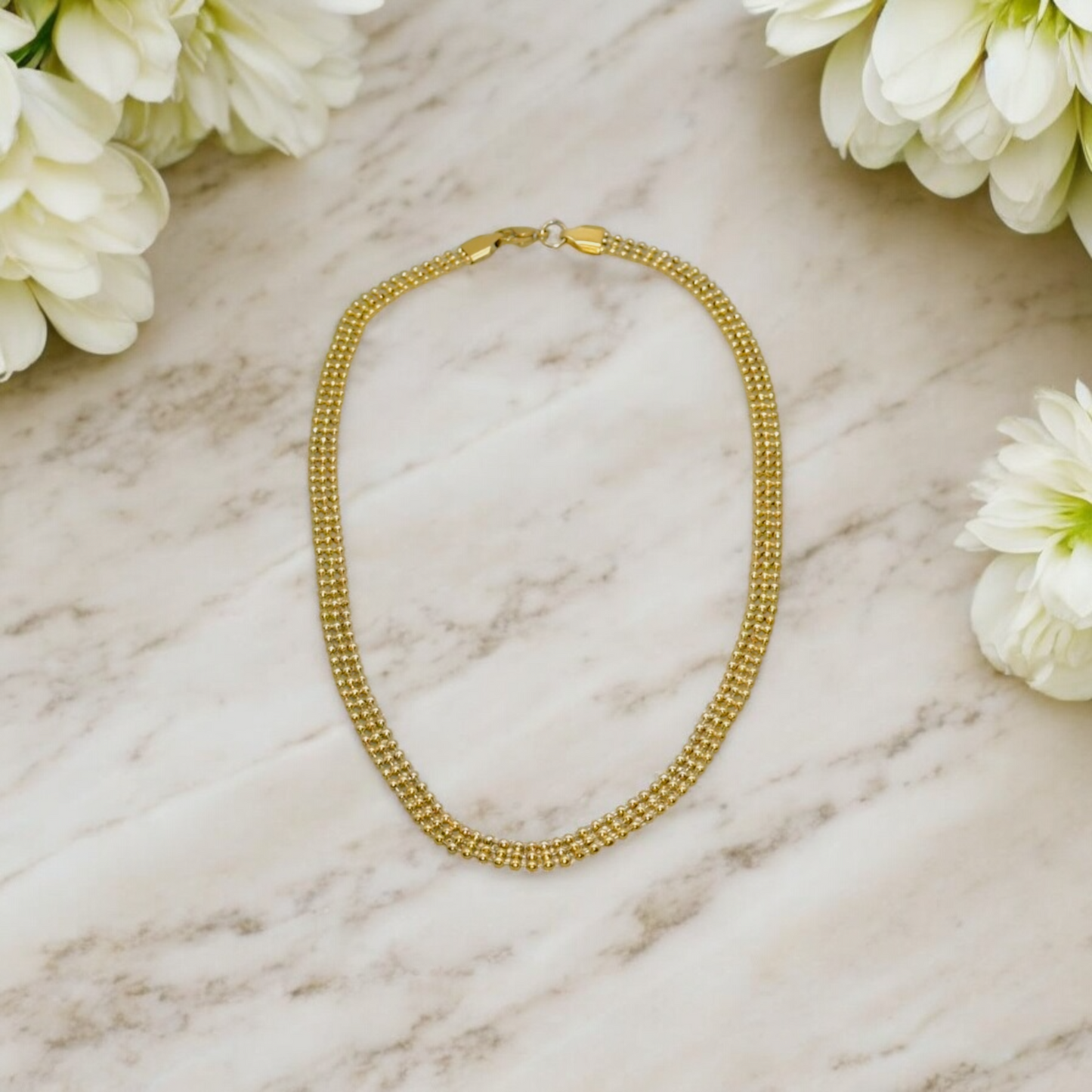 Collier Split en acier inoxydable doré.