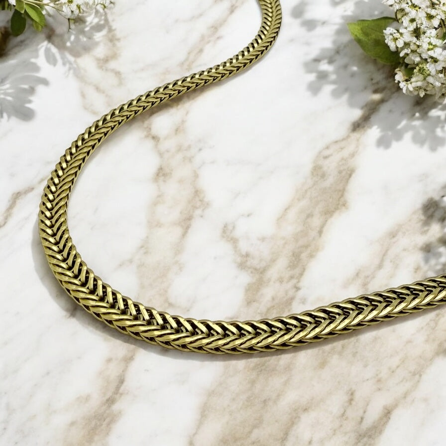 Collier Kansas City en acier inoxydable doré.